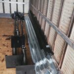 Disassembled GJ Roller Doors shutter parts ready for transport.
