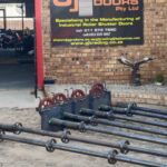 Outdoor storage of GJ Roller Doors mechanism bars.