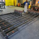 GJ Roller Doors worker is counting roller bars.