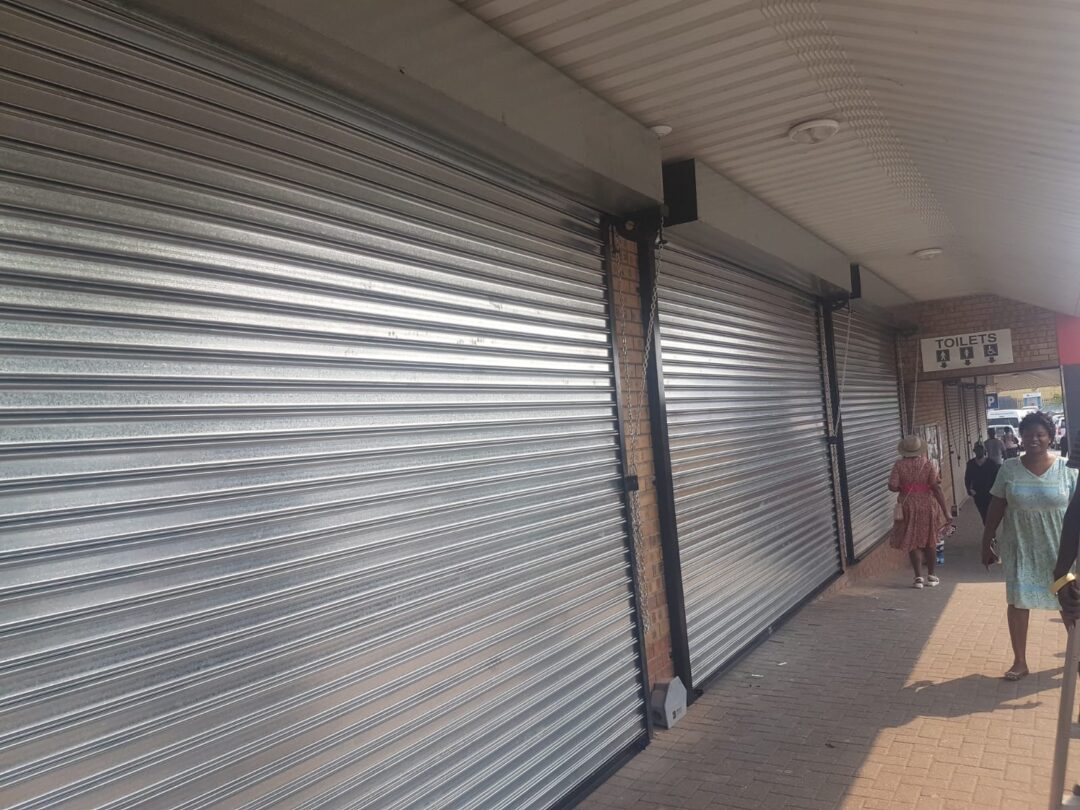 GJ Roller Doors triple shutter mall installation