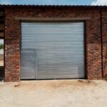 GJ Roller Doors roller shutter with integrated door